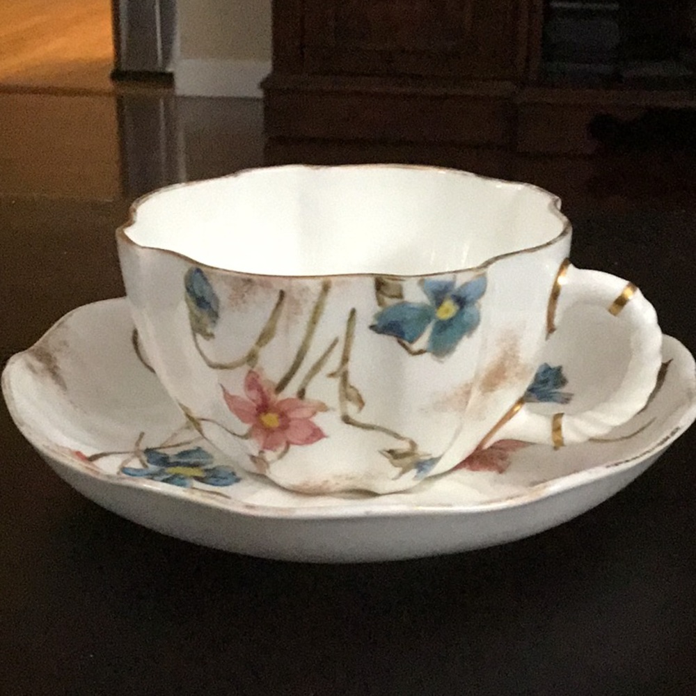 English tea cup and plate as a set period. Bone china by Royal Crown derby.